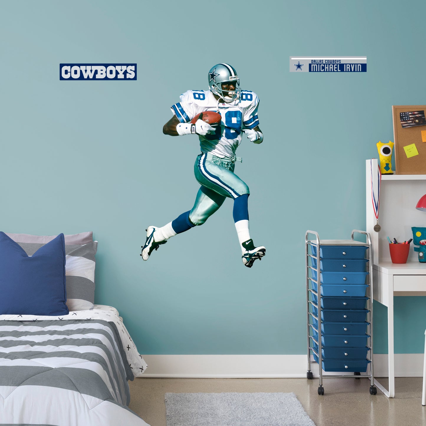 Giant Athlete + 2 Decals You can show off your love for NFL legend and Hall of Famer Michael Irvin with this high-quality wall decal. Wearing his iconic number 88 Dallas Cowboys jersey, this decal shows off The Playmaker leaving defenders in the dust! Luckily, you won't have to worry about trying to tackle Irvin yourself - this wall decal can be easily applied and removed from almost any surface. How 'bout them Cowboys?!