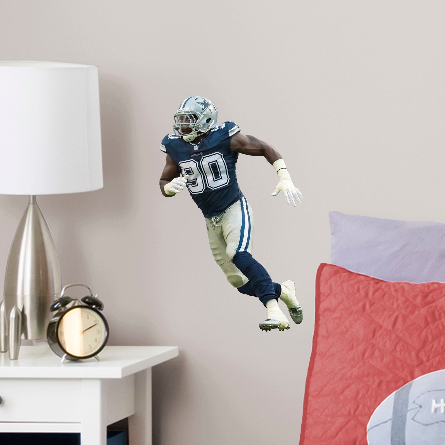 Large Athlete + 2 Decals (10"W x 16"H) Show your support for one of the best defensive linemen in the NFL with this reusable DeMarcus Lawrence wall decal! This two-time Pro Bowler is quickly climbing his way up the all-time sacks list and is already one of the all-time great Dallas Cowboys players. This high-quality decal can be easily applied, removed, and reused so your support for DeMarcus Lawrence can follow you wherever you go!