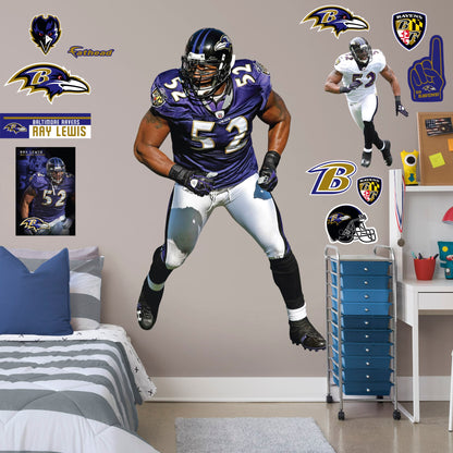Life-Size Athlete + 12 Decals (47"W x 78"H) He’s the second linebacker ever to win the NFL’s Super Bowl MVP Award, and now, Brickwall, a.k.a. Ray Lewis, is ready for the bedroom, living room or locker room. This rugged, removable wall decal features the full figure of two-time Super Bowl champion No. 52 in his black, purple and metallic gold Baltimore Ravens best. Go Ravens!