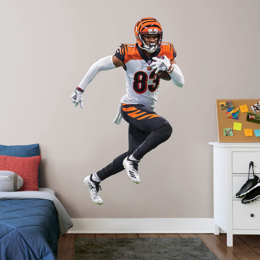 Life-Size Athlete + 2 Decals (47"W x 77"H) Bring the action of the NFL into your home with a wall decal of Tyler Boyd! High quality, durable, and tear resistant, you'll be able to stick and move it as many times as you want to create the ultimate football experience in any room!