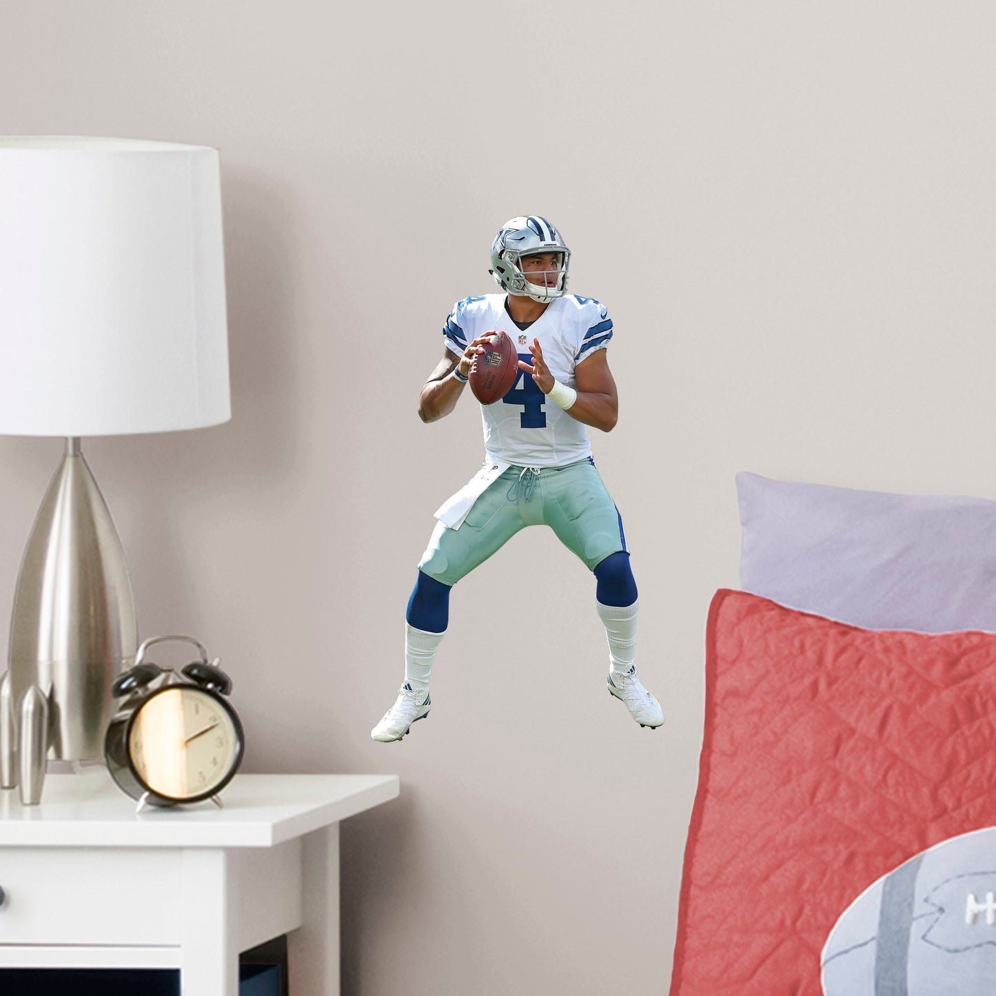 Large Athlete + 2 Decals (9"W x 16"H) Make 4 your personal lucky number and remind yourself that anything is possible with a high-quality, life-sized Dak Prescott vinyl decal. Turn your favorite room, man cave, or playroom into Cowboys Stadium, complete with Prescott getting ready to throw for the touchdown. Count on this durable decal to be just as tough as your favorite quarterback - it's designed to be easily removed and reused over and over again.