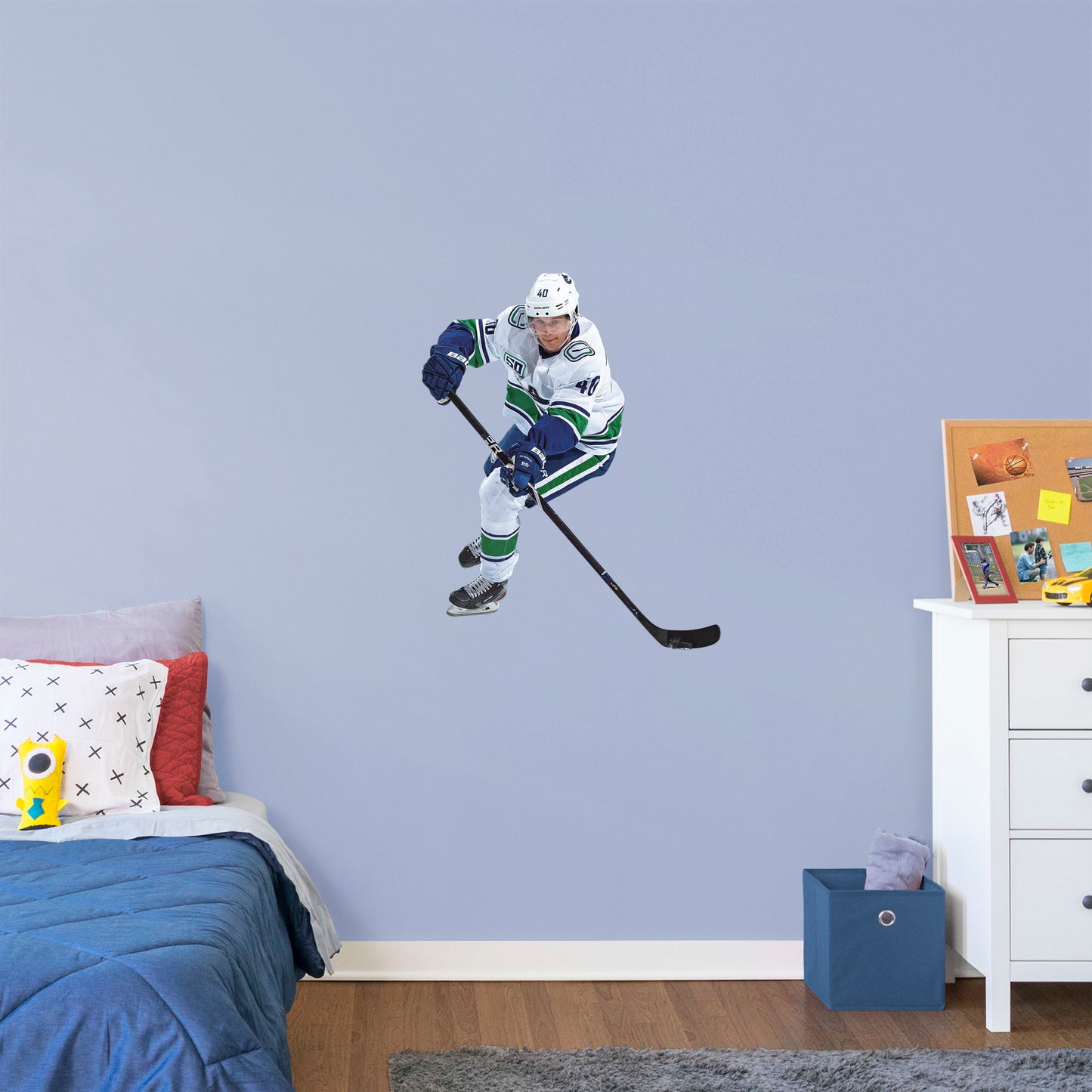X-Large Athlete + 2 Decals (33"W x 42"H) Elias Peterson has been a standout in the league since the very beginning, and now you can bring him to life in your own home with this Officially Licensed NHL Removable Wall Decal! Canucks fans and NHL fanatics alike will love this durable and high quality wall decal and, with the excitement it brings to your space, it's almost as good as being at Rogers Arena!