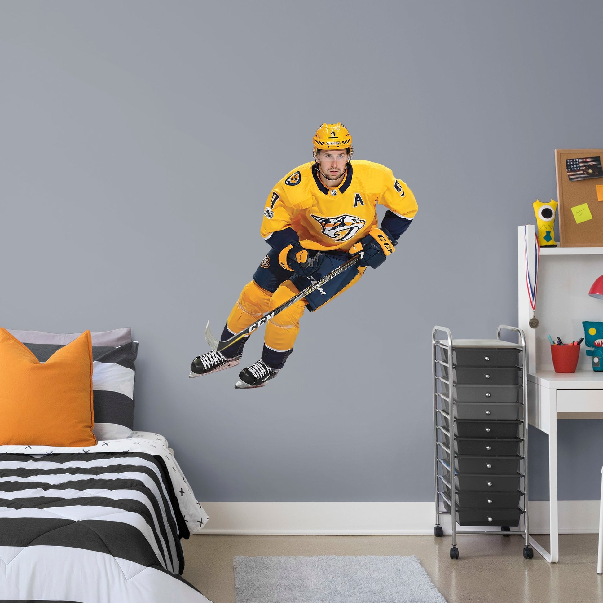 Giant Athlete + 2 Decals (43"W x 48"H) Filip Forsberg has been a force in the NHL since he was first drafted in 2012 and now you can bring him to life in your home with this Officially Licensed NHL Removable Wall Decal! Pictured here in action on the ice, this durable and reusable wall decal is sure to standout in your bedroom, office, or fan room!