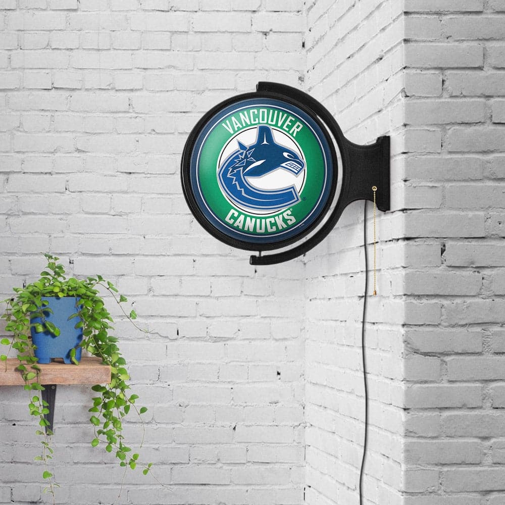 Vancouver Canucks: Original Round Rotating Lighted Wall Sign - The Fan-Brand