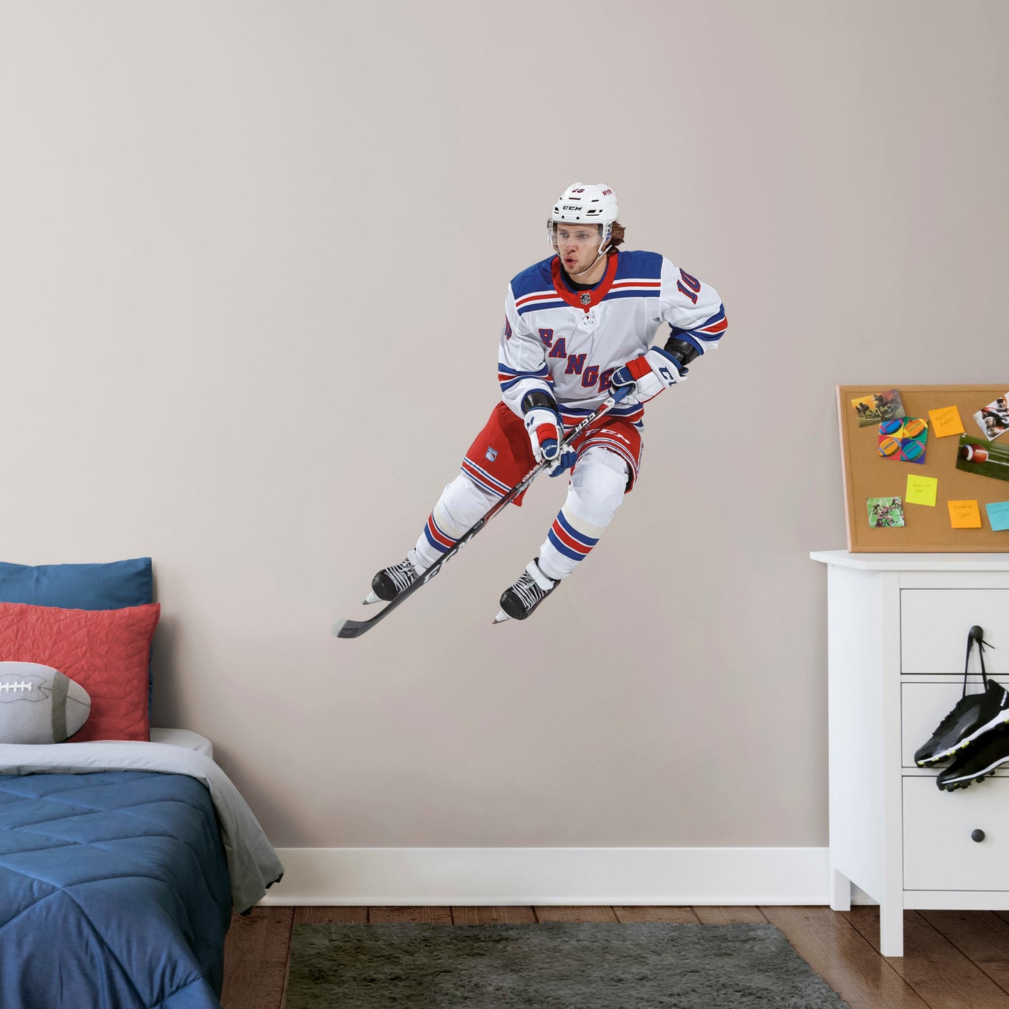 Giant Athlete + 2 Decals (40"W x 46"H) The opposing goaltender had better be in position when Artemi Panarin takes the ice in this officially licensed NHL wall decal. The left wing for the New York Rangers has been making noise throughout the league since going undrafted and then becoming one of the NHL's top rookies a few years ago. This high-quality decal of the Breadman is the perfect addition to any Rangers fan's game room or bar, and can be easily removed in case it needs to be regifted.