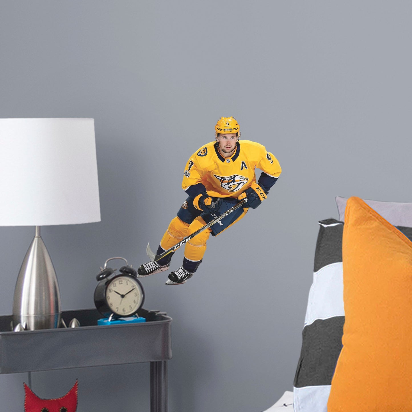 Large Athlete + 2 Decals (14"W x 16"H) Filip Forsberg has been a force in the NHL since he was first drafted in 2012 and now you can bring him to life in your home with this Officially Licensed NHL Removable Wall Decal! Pictured here in action on the ice, this durable and reusable wall decal is sure to standout in your bedroom, office, or fan room!