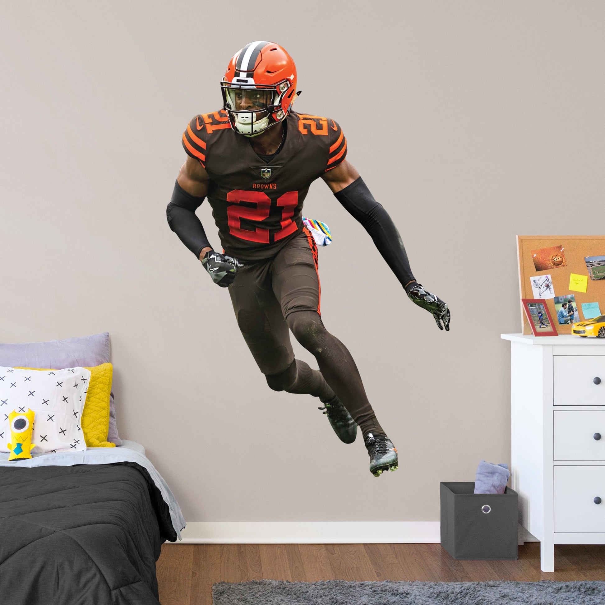 Life-Size Athlete + 2 Decals (49"W x 75"H) Bring the action of the NFL into your home with a wall decal of Denzel Ward! High quality, durable, and tear resistant, you'll be able to stick and move it as many times as you want to create the ultimate football experience in any room!