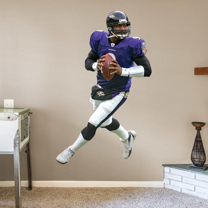 Life-Size Athlete + 2 Decals (49"W x 78"H) Bring the action of the NFL into your home with a wall decal of Steve McNair! High quality, durable, and tear resistant, you'll be able to stick and move it as many times as you want to create the ultimate football experience in any room!