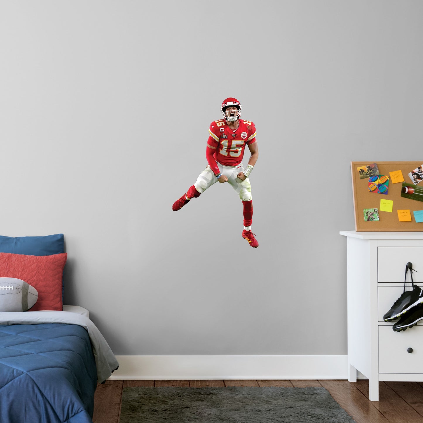 X-Large Athlete + 2 Decals (22"W x 38"H) Celebrate the Chiefs' epic Super Bowl LIV win over the 49ers with this high-quality, repositionable decal of MVP quarterback Patrick Mahomes celebrating the victory. Featuring plenty of the Chiefs' red and gold, this enthusiastic Magic Mahomes decal will brighten every day of your week. It's perfect for dorms, bedrooms, and sports bars because this durable, reusable Mahomes decal only damages the competition, not your walls.