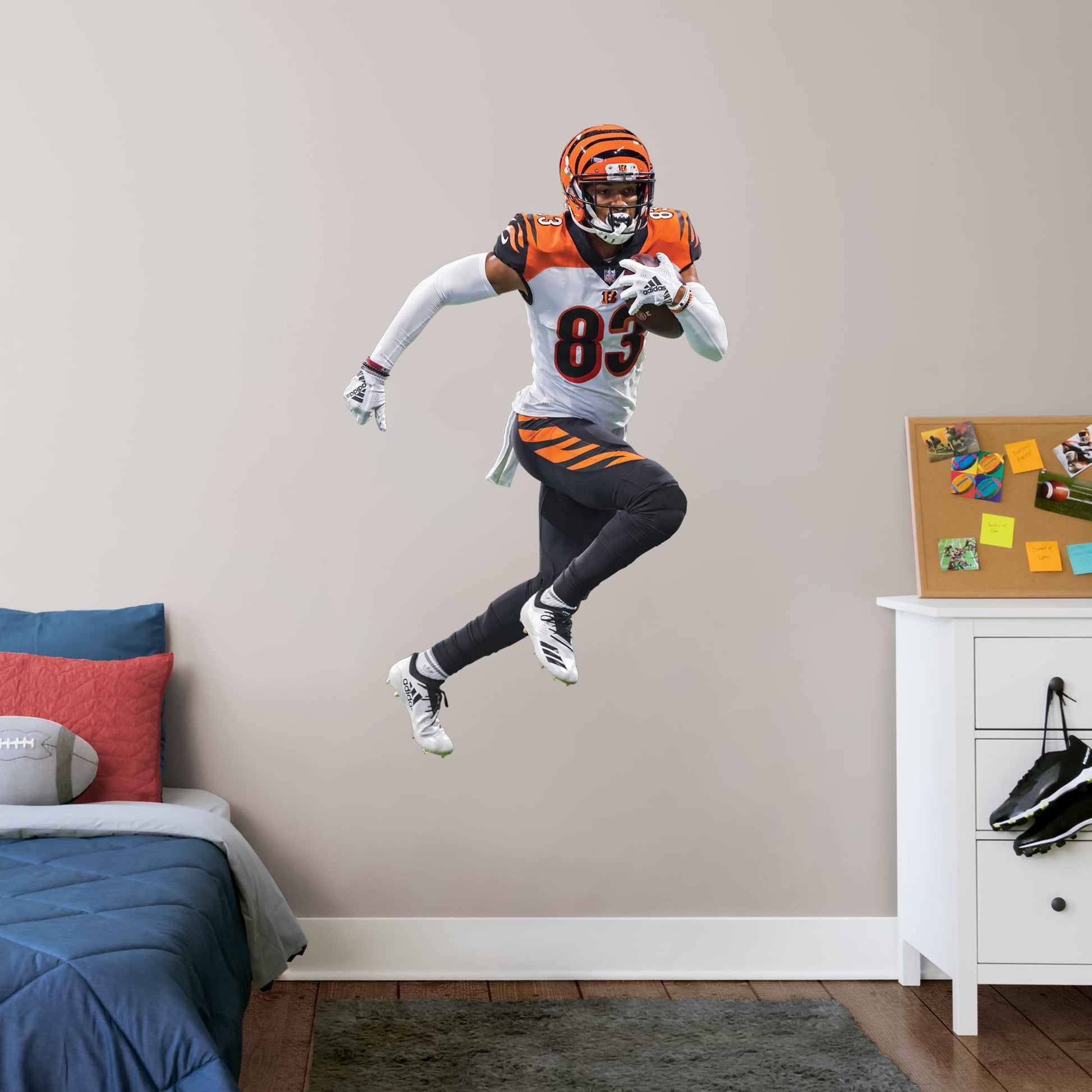 Giant Athlete + 2 Decals (31"W x 51"H) Bring the action of the NFL into your home with a wall decal of Tyler Boyd! High quality, durable, and tear resistant, you'll be able to stick and move it as many times as you want to create the ultimate football experience in any room!