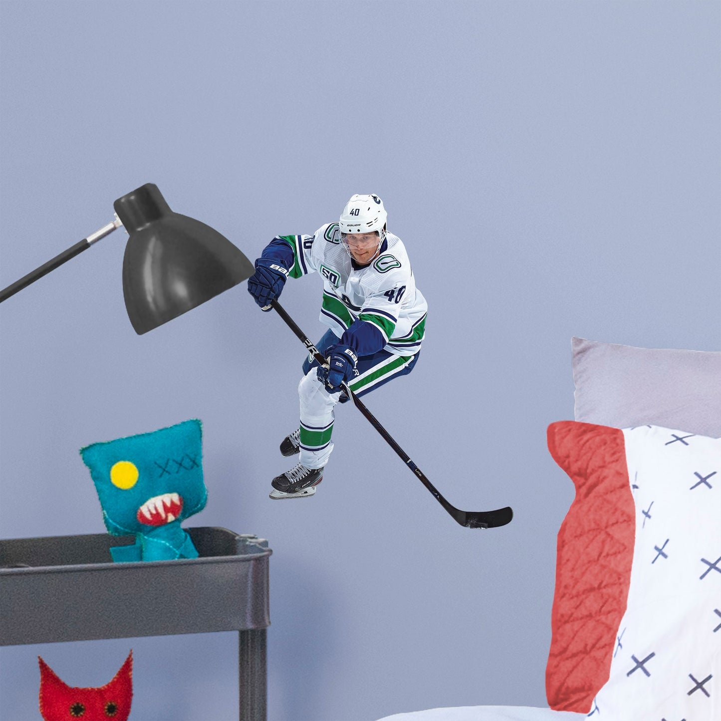 Large Athlete + 2 Decals (14"W x 16"H) Elias Peterson has been a standout in the league since the very beginning, and now you can bring him to life in your own home with this Officially Licensed NHL Removable Wall Decal! Canucks fans and NHL fanatics alike will love this durable and high quality wall decal and, with the excitement it brings to your space, it's almost as good as being at Rogers Arena!