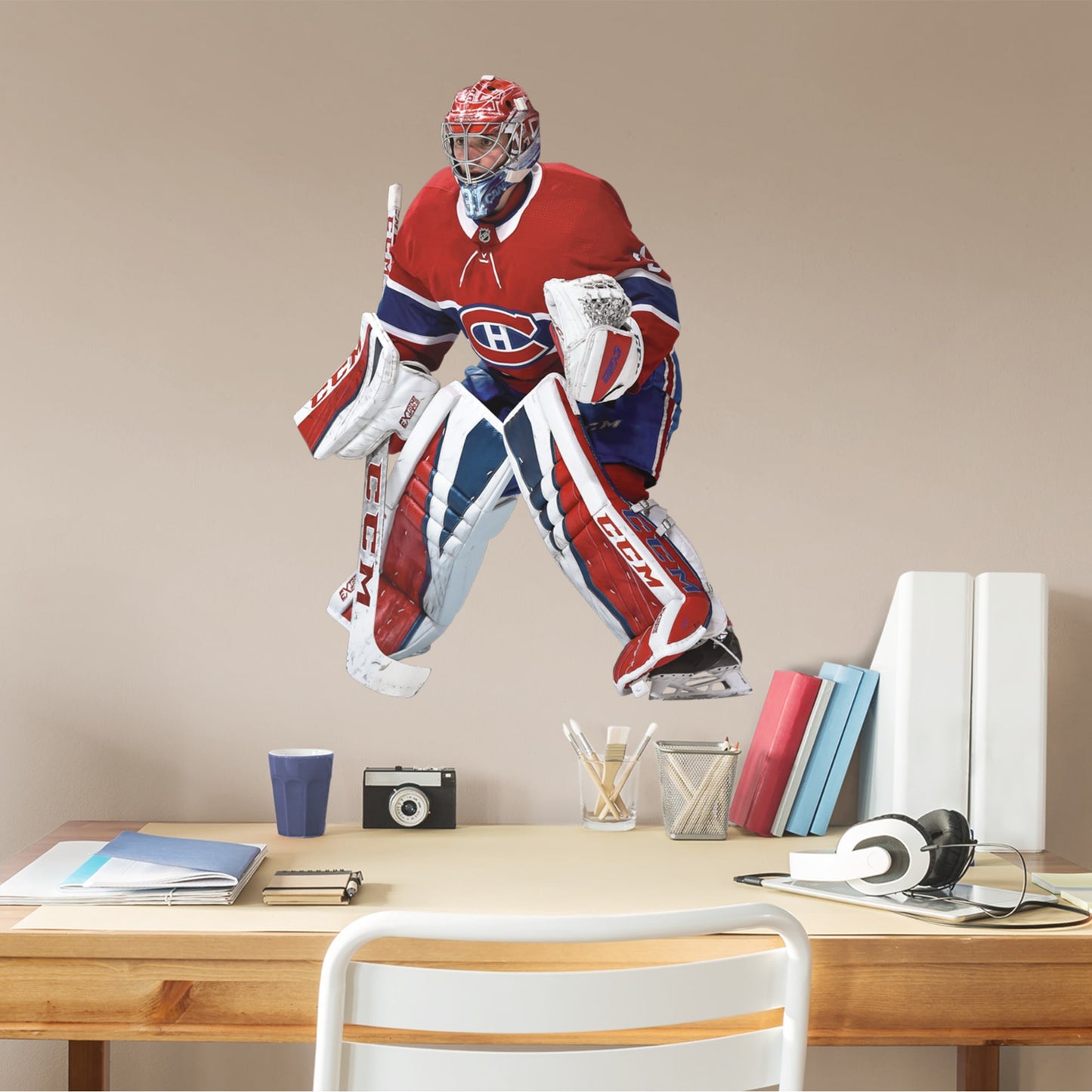 Featuring the repeat NHL All-Star - widely considered the greatest goaltender in the world - tending the goal in his trademark butterfly style, this reusable, high-quality decal resists rips, tears, and scoring attempts - and it won't damage the walls.