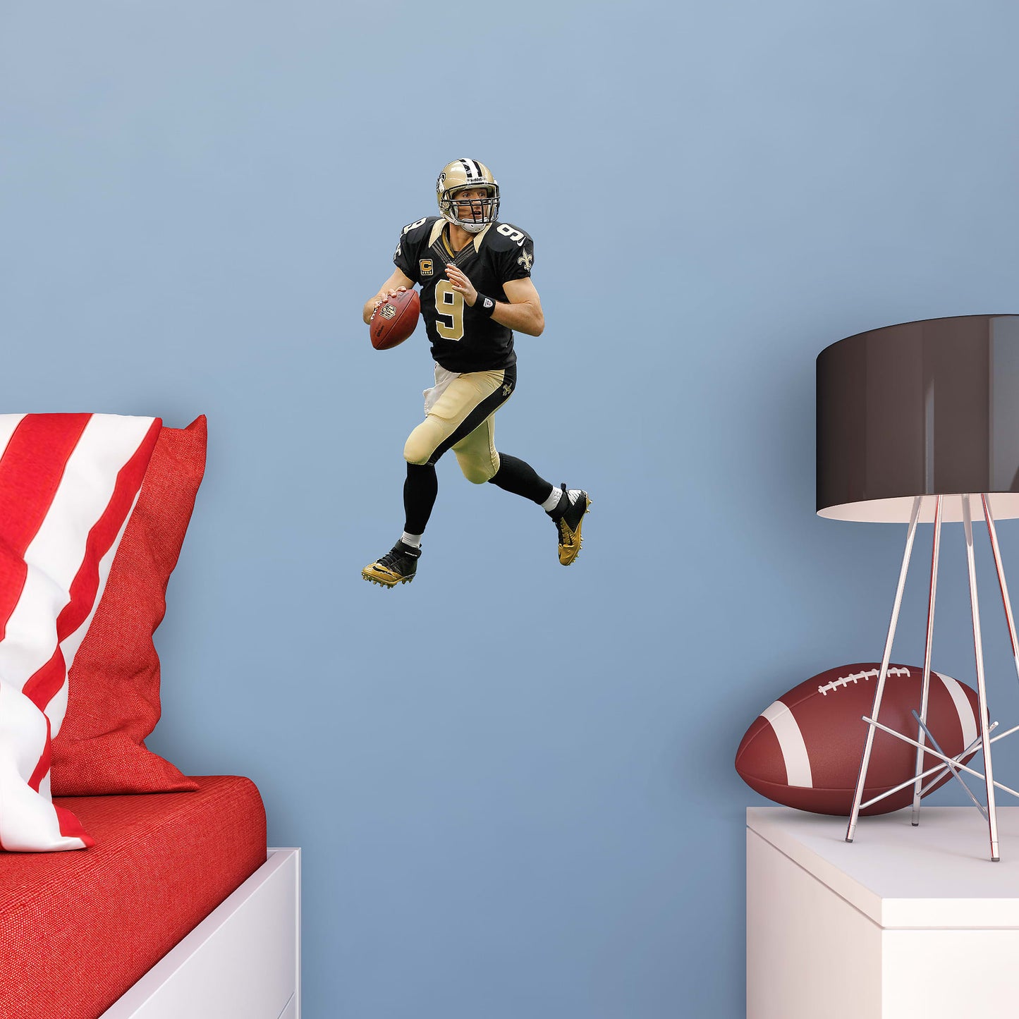 Bring the action of the NFL into your home with a wall decal of Drew Brees! High quality, durable, and tear resistant, you'll be able to stick and move it as many times as you want to create the ultimate football experience in any room!