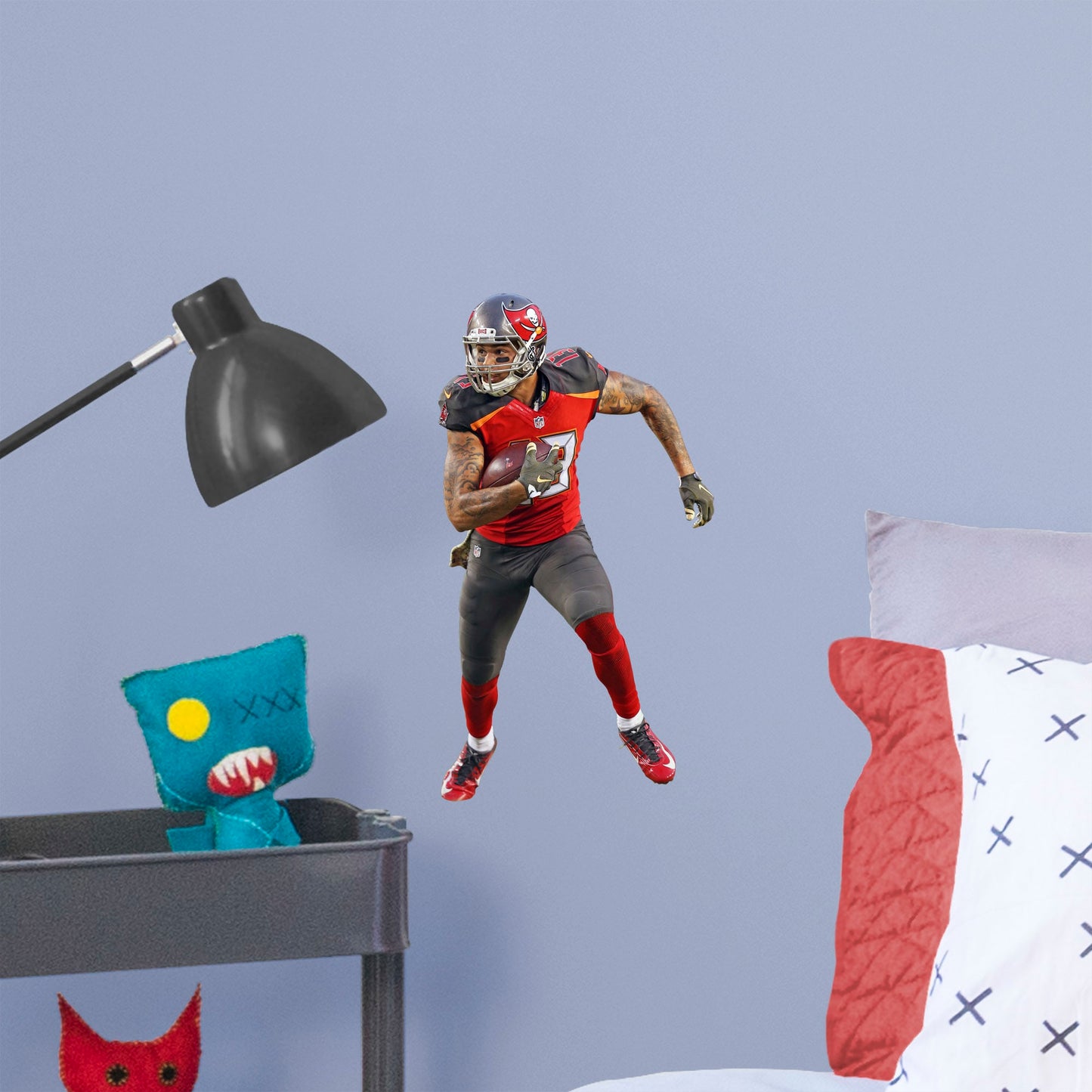 X-Large Athlete + 2 Decals (21"W x 39"H) Bring the action of the NFL into your home with a wall decal of Mike Evans! High quality, durable, and tear resistant, you'll be able to stick and move it as many times as you want to create the ultimate football experience in any room!